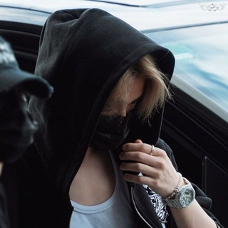 J.